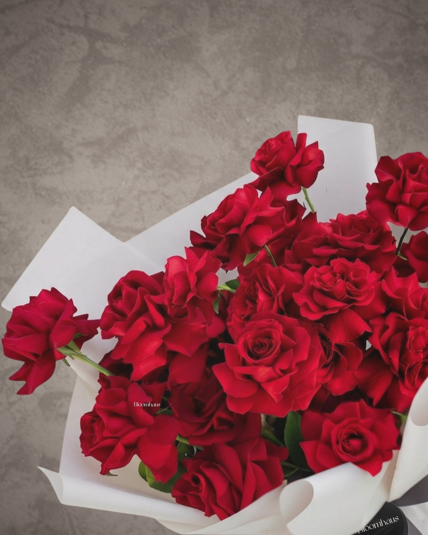 Bouquet of vibrant Ecuadorian reflexed roses from BLOOMHAUS MELBOURNE, showcasing lush, colorful flower arrangement.