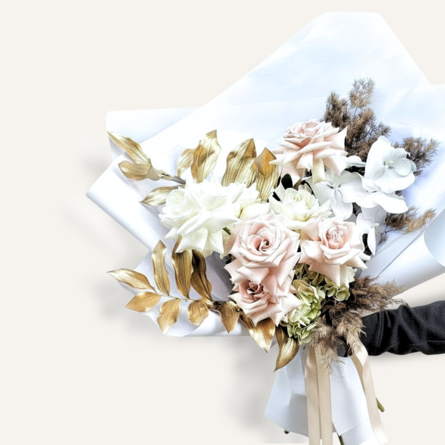 Bouquet of flowers with white and pink roses, gold leaves, and dried elements on a white background Bloomhaus Melbourne same day delivery