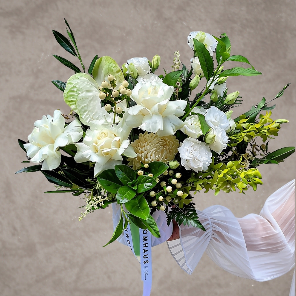 Embrace - white roses & seasonal blooms pot arrangement