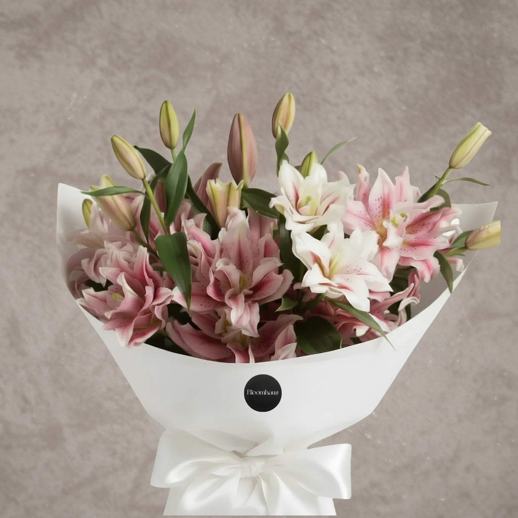 Bouquet of vibrant rose lilies from Bloomhaus Melbourne, showcasing elegant oriental flowers in full bloom.
