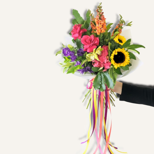 Colorful Flower Bomb bouquet by Bloomhaus Melbourne featuring vibrant mixed flowers in a lively and eye-catching arrangement.