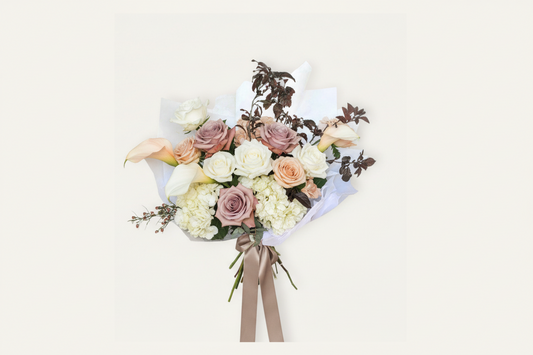 Fresh bouquet of mixed flowers from Bloomhaus Melbourne, featuring vibrant blooms and lush greenery in a stylish arrangement.