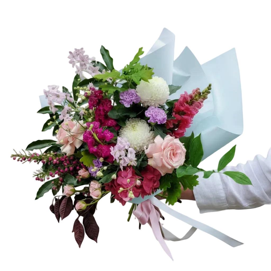 Fresh floral bouquet from Bloomhaus Melbourne featuring vibrant, colorful flowers arranged in a beautiful bouquet.