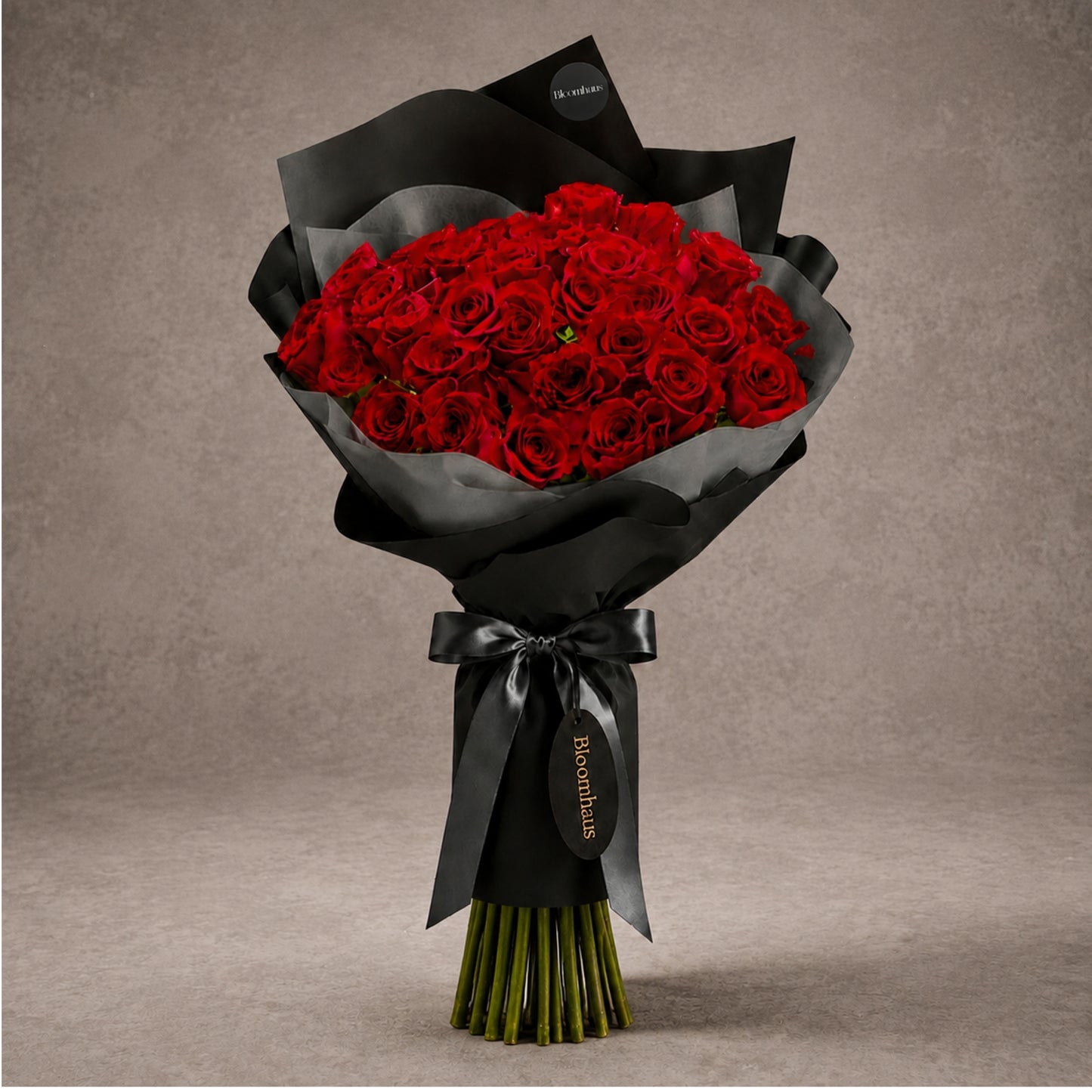 Long stem red rose bouquet from BLOOMHAUS MELBOURNE featuring lush, vibrant roses arranged beautifully for floral elegance.