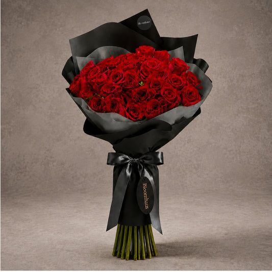 Long stem red rose bouquet from BLOOMHAUS MELBOURNE featuring lush, vibrant roses arranged beautifully for floral elegance.