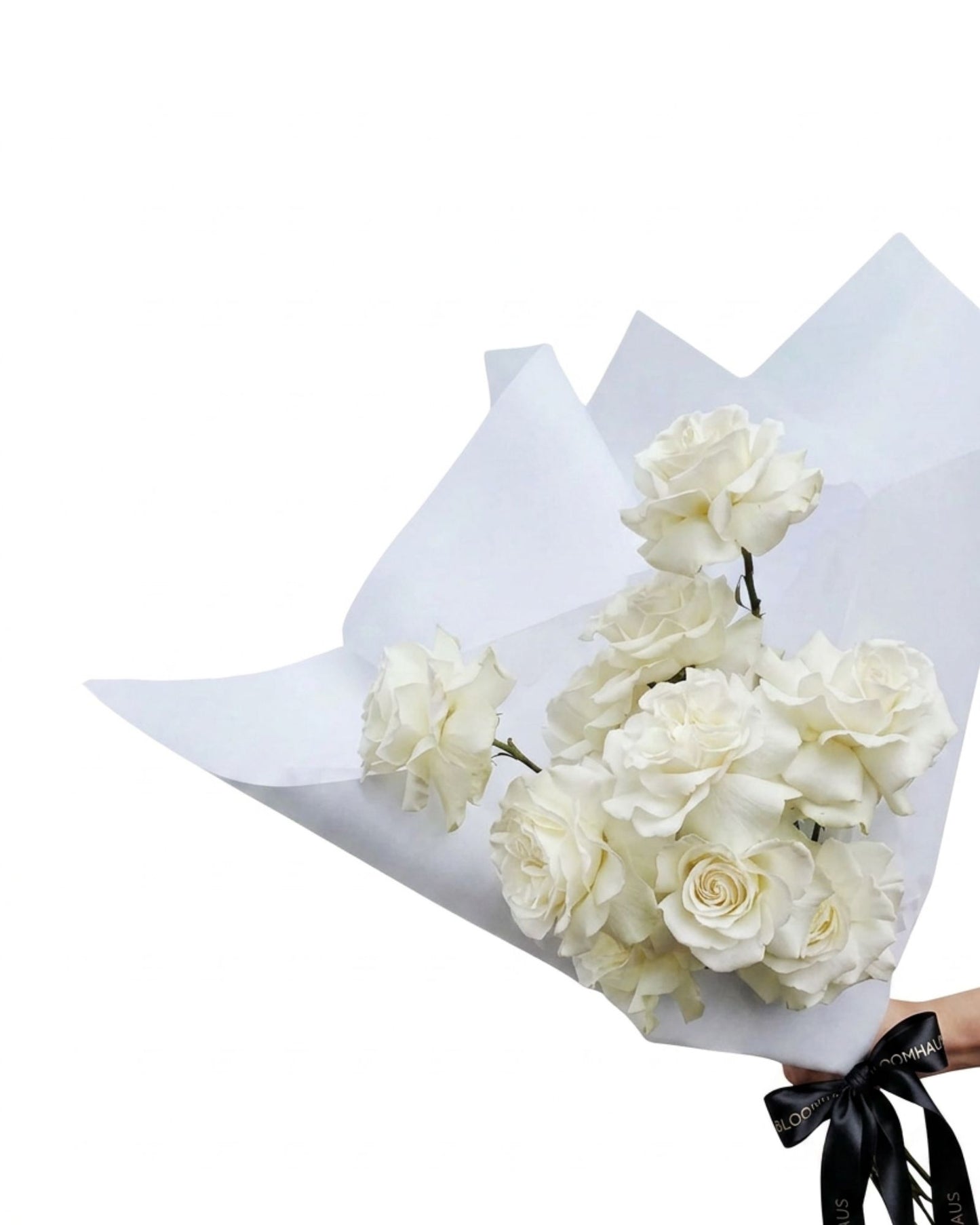 Bouquet of Ecuadorian reflexed roses from BLOOMHAUS MELBOURNE showcasing vibrant, lush flowers in a natural arrangement.