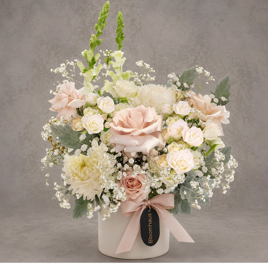 Reflexed roses flower arrangement named Angel by BLOOMHAUS MELBOURNE, featuring elegant, blooming roses in a natural display.