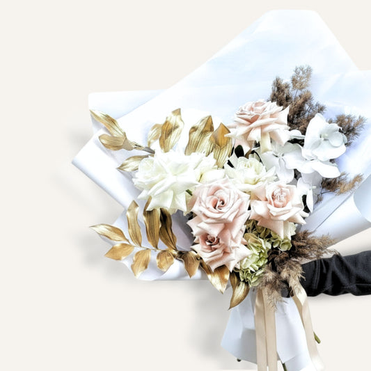 Bouquet of flowers with white and pink roses, gold leaves, and dried elements on a white background Bloomhaus Melbourne same day delivery