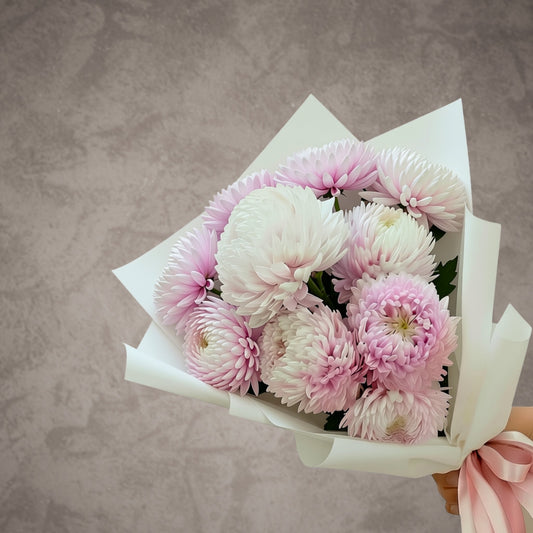 Bloomhaus Melbourne Disbuds en Masse arranged in a bouquet, showcasing vibrant, colorful flower buds.