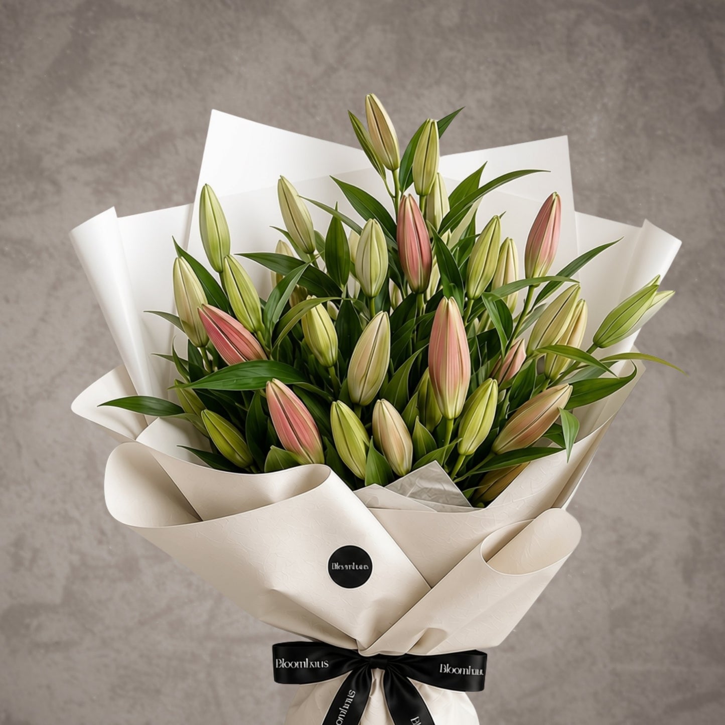 Bouquet of vibrant Oriental lilies in bloom, arranged in a lush floral display by BLOOMHAUS MELBOURNE