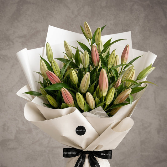 Bouquet of vibrant Oriental lilies in bloom, arranged in a lush floral display by BLOOMHAUS MELBOURNE