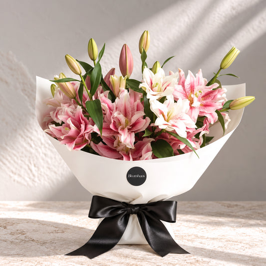 Bouquet of vibrant pink rose lilies from BloomHaus Melbourne, showcasing large, elegant oriental lilies in full bloom.