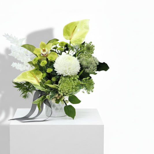 Fresh white and green flower arrangement in a ceramic pot by Bloomhaus Melbourne Florist, featuring Prosperity blooms.