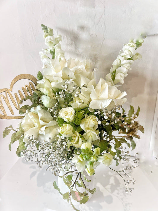BLOOMHAUS MELBOURNE flower arrangement Mothers Love | Reflexed white Rose and Babies Breath Arrangement in a pink Ceramic Vase with a love heart and gold details