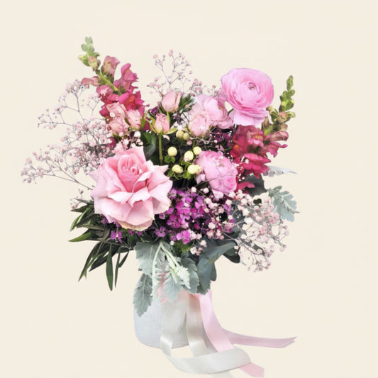 Sweet pink ceramic vase with blooming reflexed roses flower arrangement by BLOOMHAUS MELBOURNE
