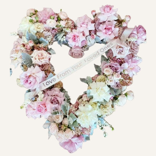 Heartfelt heart-shaped sympathy wreath with white and pink flowers, floral funeral wreath by BLOOMHAUS MELBOURNE.